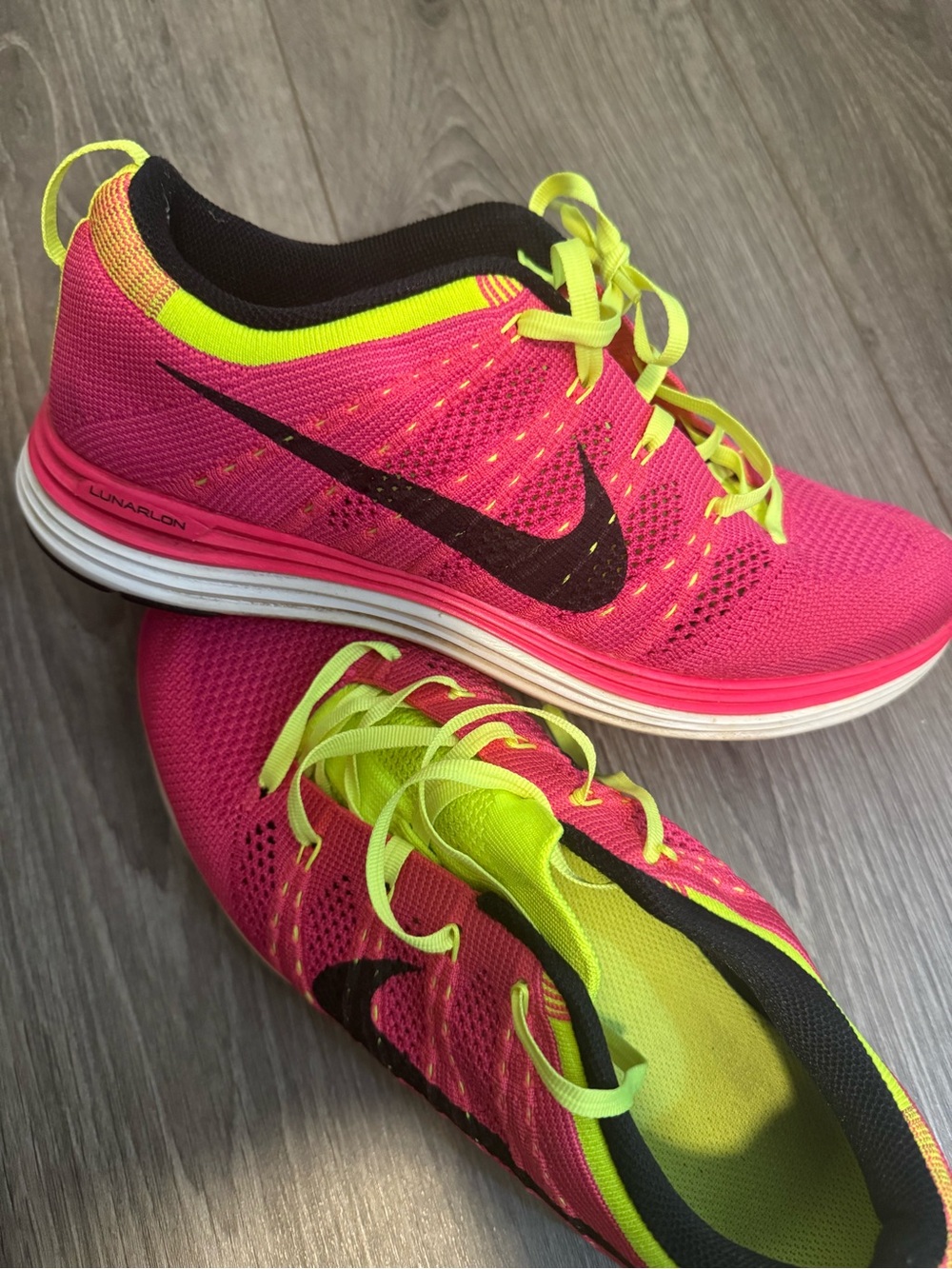 Nike Women’s Hot Pink & Neon Yellow Flyknit Running Sneakers - Picture 3 of 3